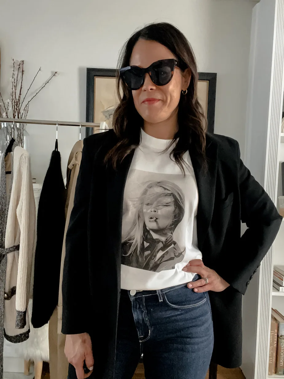 wearing blazer with graphic tee and sunglasses