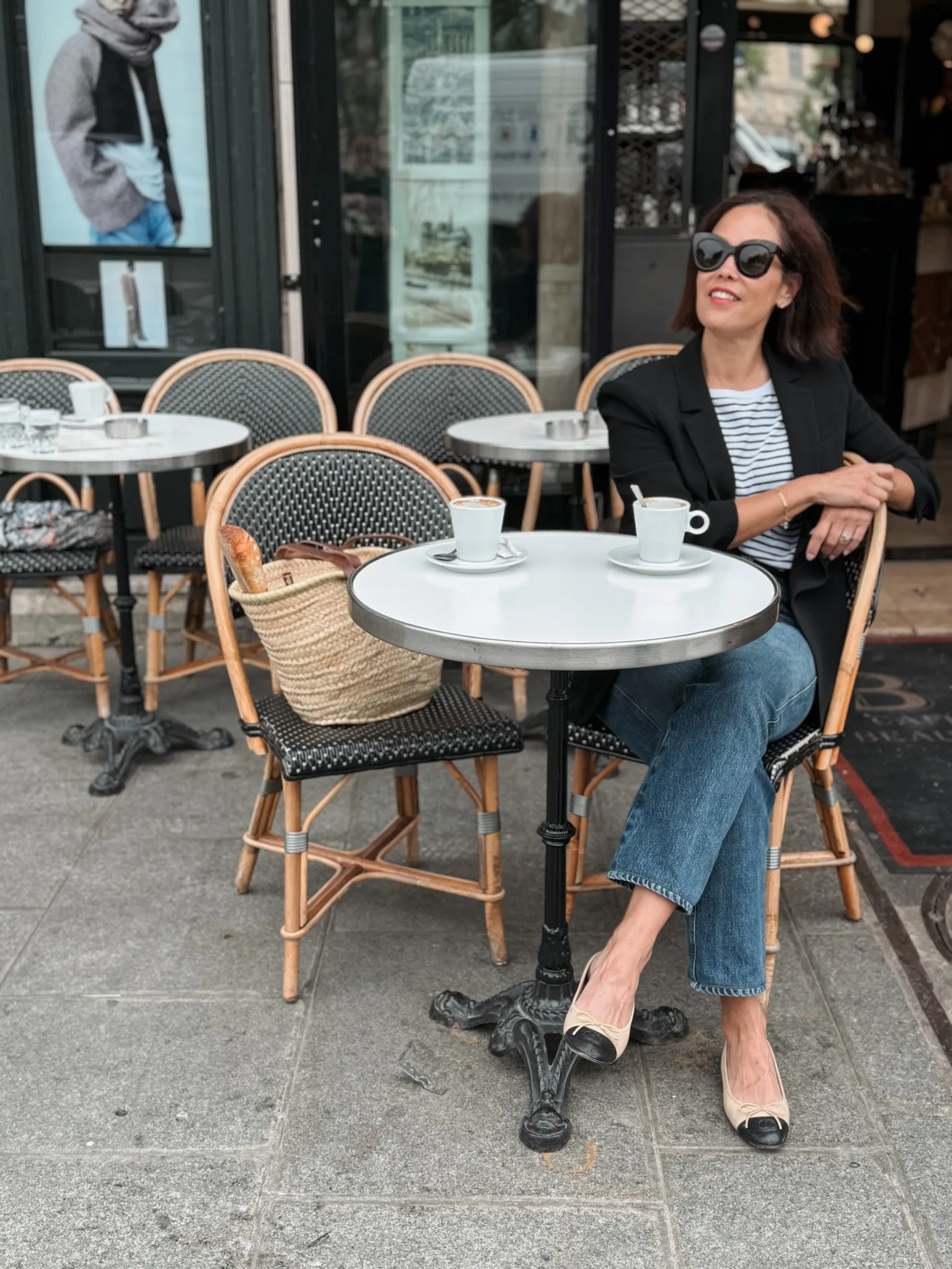 Sitting outdoors at a cafe in Paris.