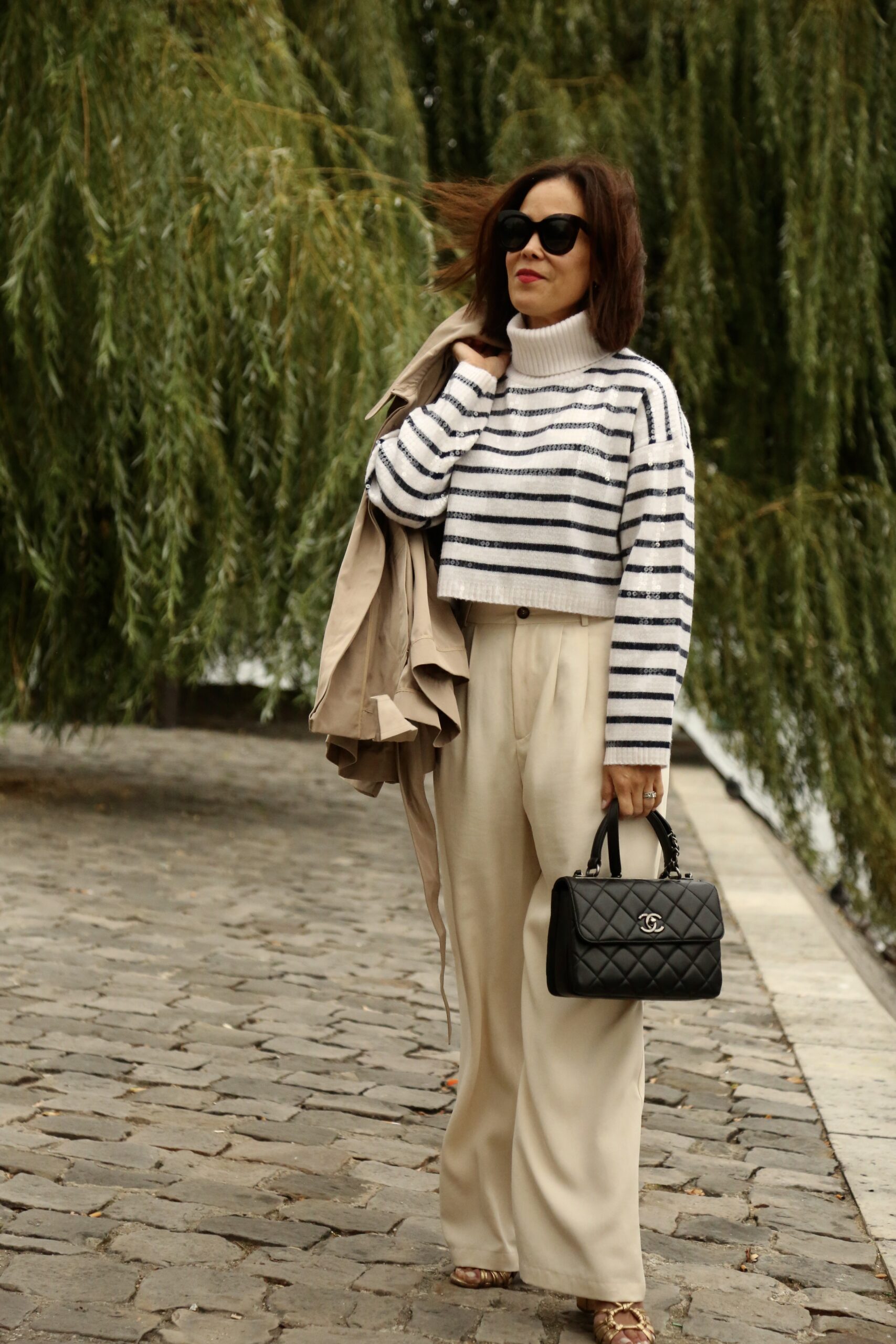 Woman wearing trousers in Paris for 10 pieces I always pack for Paris.