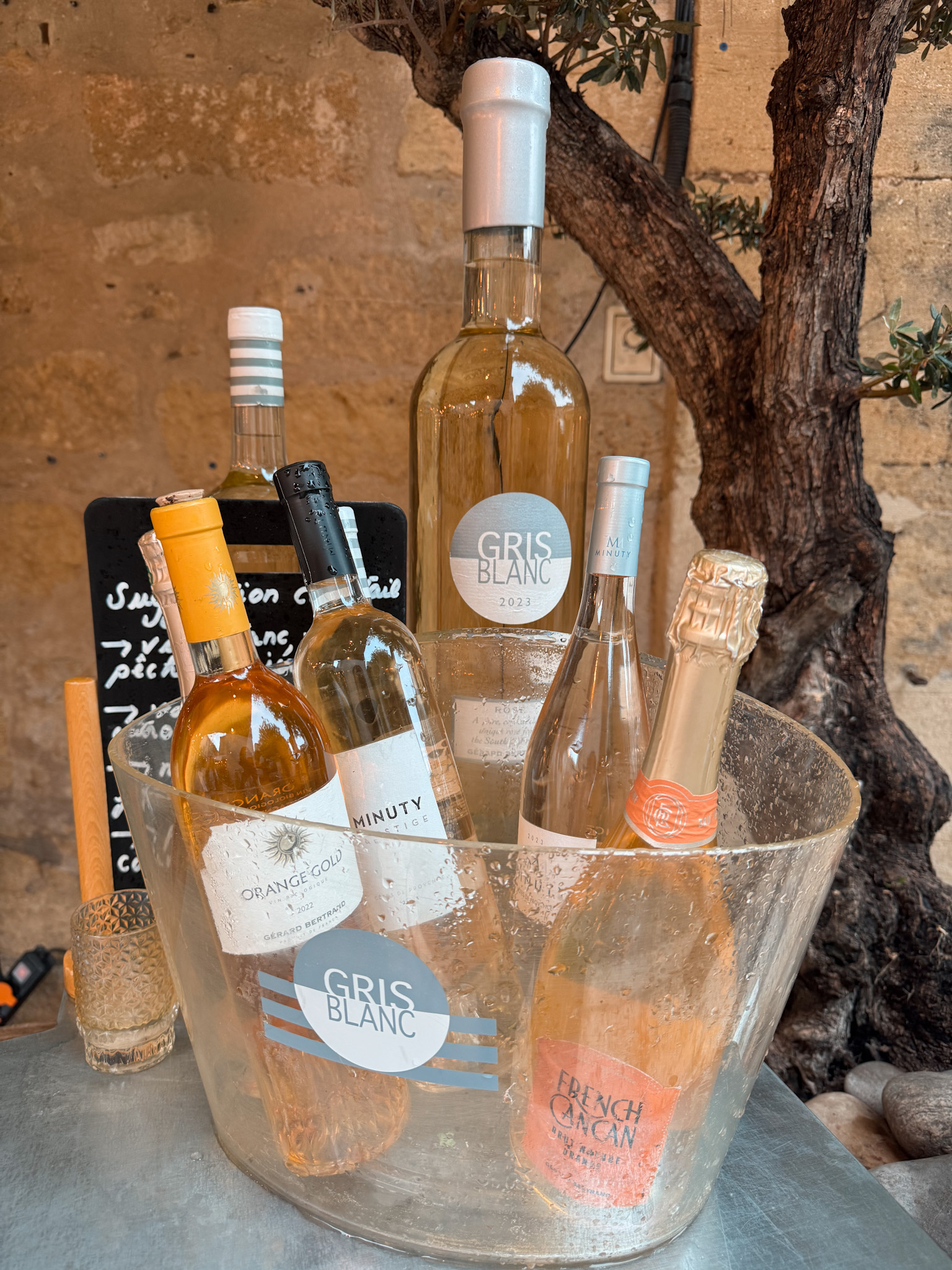Provence rosé wines on ice during a wine tasting experience in Lourmarin village