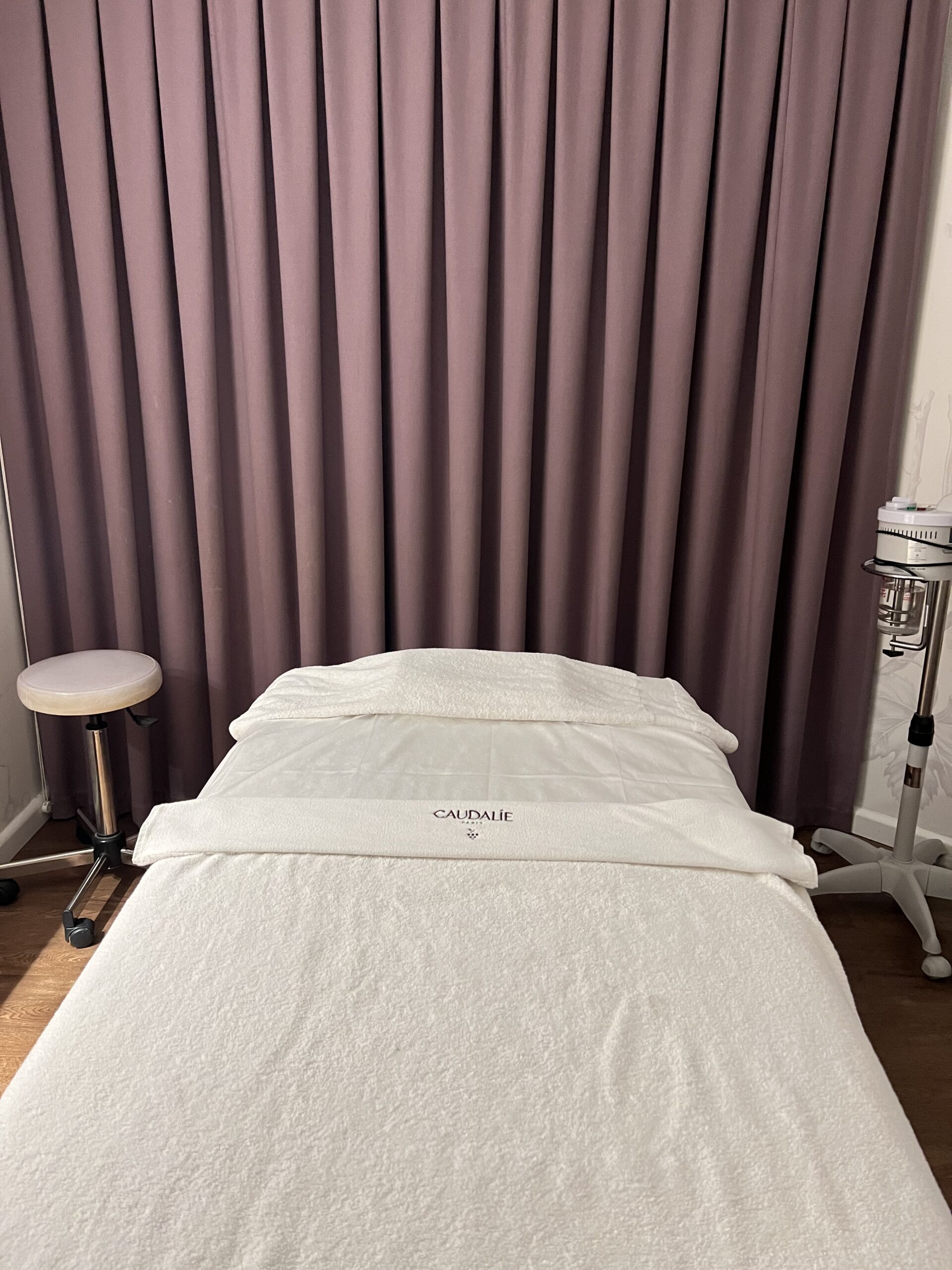 Treatment room at the Caudalíe spa in Saint-Germain-des-Prés, a French skincare boutique offering facials in Paris
