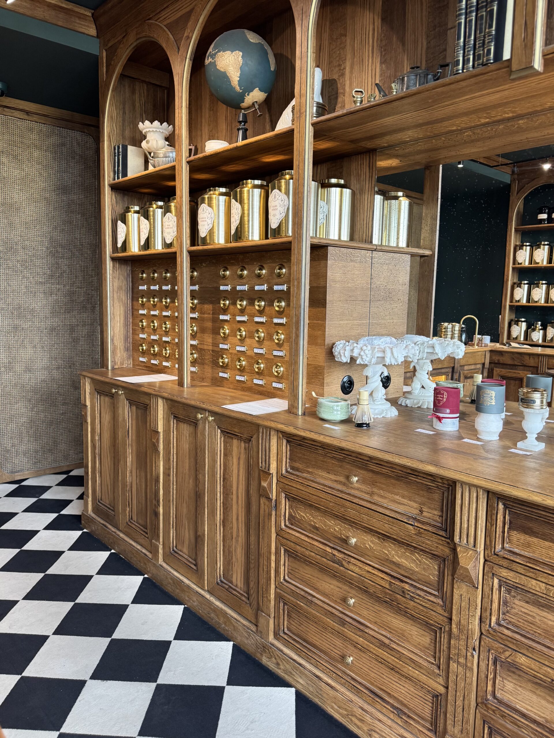 Interior of Conservatoire des Hémisphères restaurant in Paris with warm lighting and elegant dining atmosphere