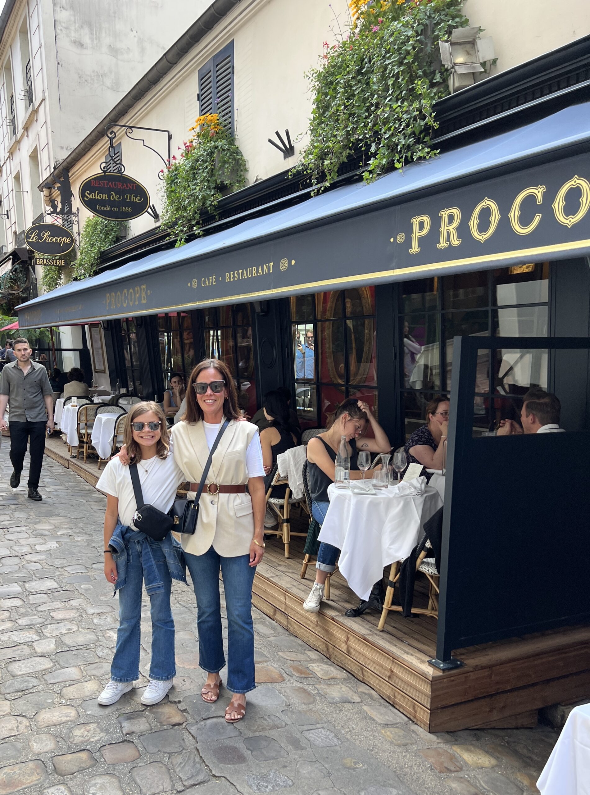 Le Procope café in Paris with outdoor terrace dining on a historic street in Saint-Germain-des-Prés